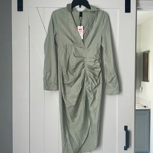 Green pin stopped dress